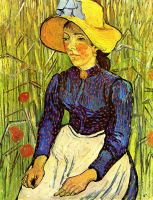 Молодая крестьянка в соломенной шляпе в пшенице