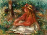 Девочка, сидящая на траве
