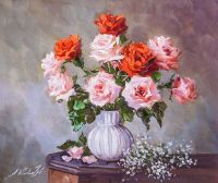 Букет розовых и коралловых роз в вазе